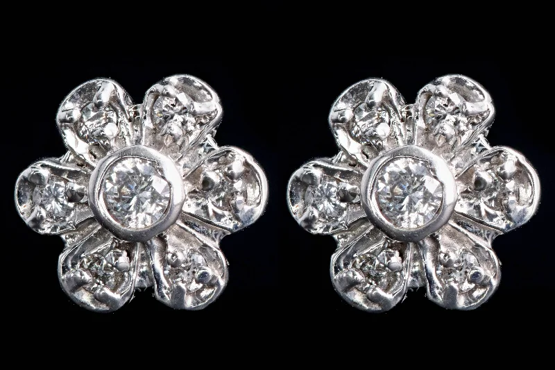 Modern 14K White Gold .20 Carat Round Brilliant Diamond Flower Stud Earrings