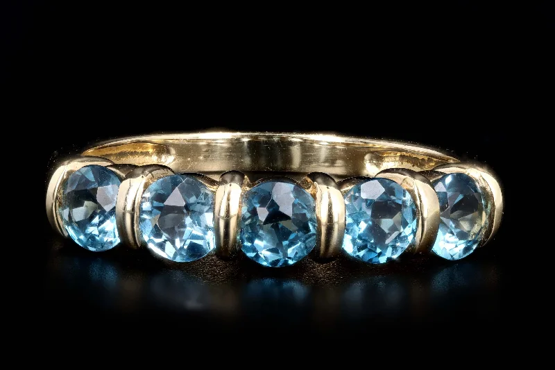 Modern 14K Yellow Gold 1.30 Carat Round Blue Topaz Band