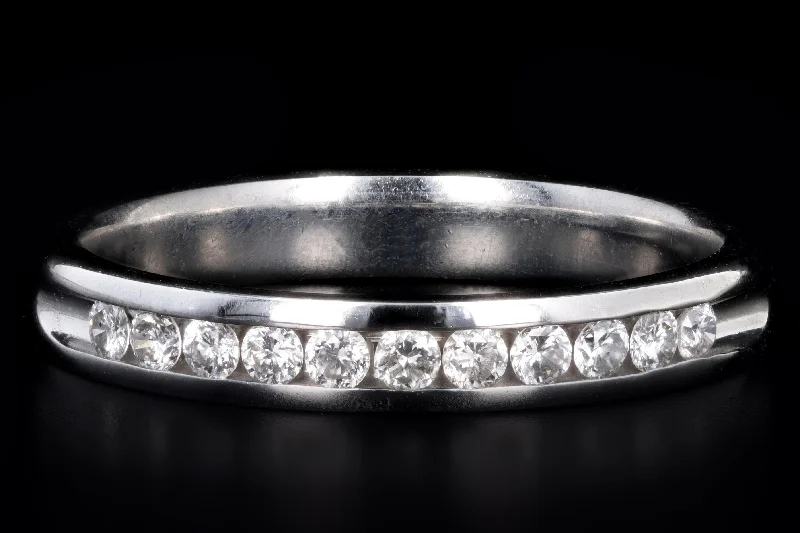 Modern 14K White Gold .25 Carat Total Weight Round Brilliant Diamond Channel Wedding Band