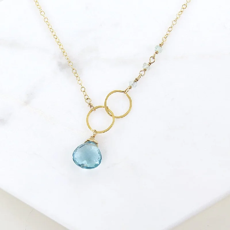 BLUE TOPAZ AND LOOPED GOLD NECKLACE